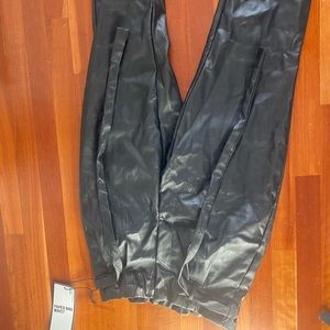 Black plastic bag waist with belt joggers